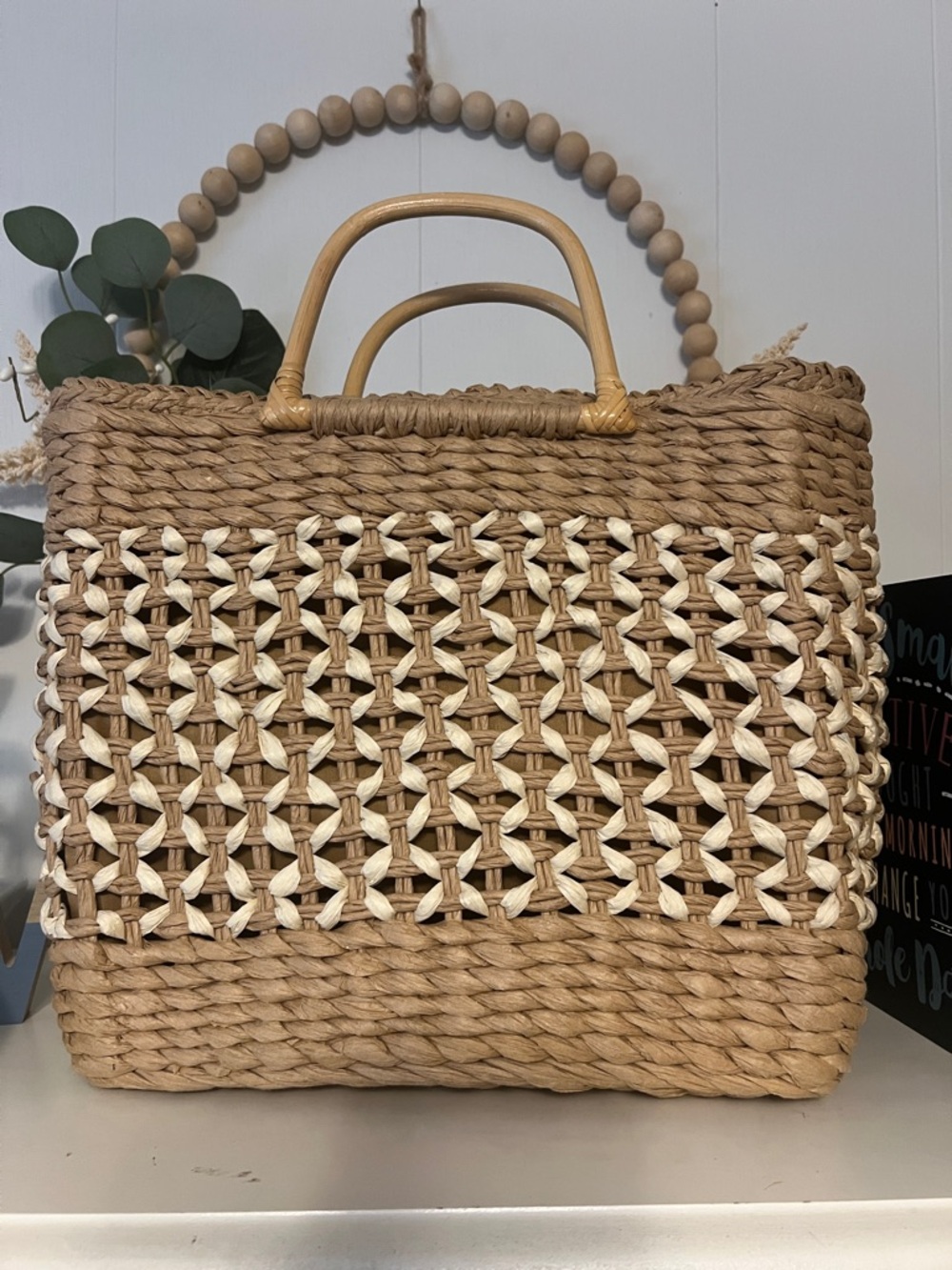 Woven Straw Tote Bag with White Accents and bamboo handles